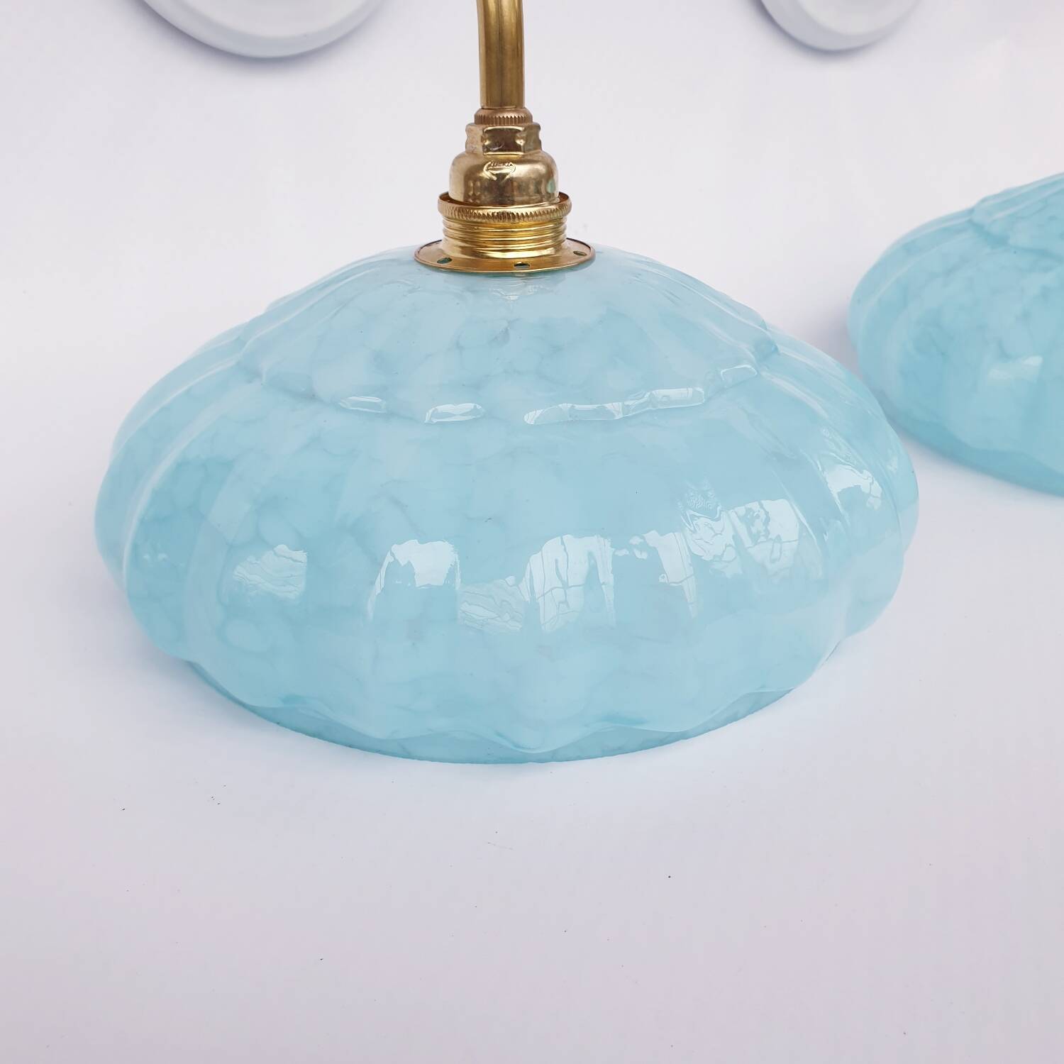 Swan neck wall lights and Clichy glass