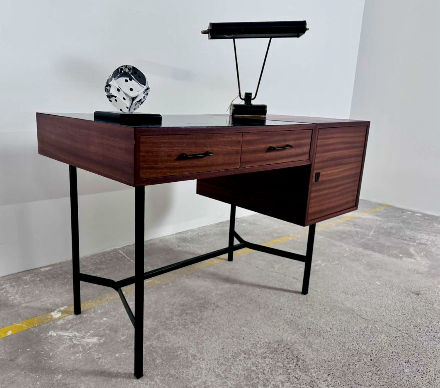 French modernist desk from the 1950s with 2 drawers, 1 cabinet, and 1 container.