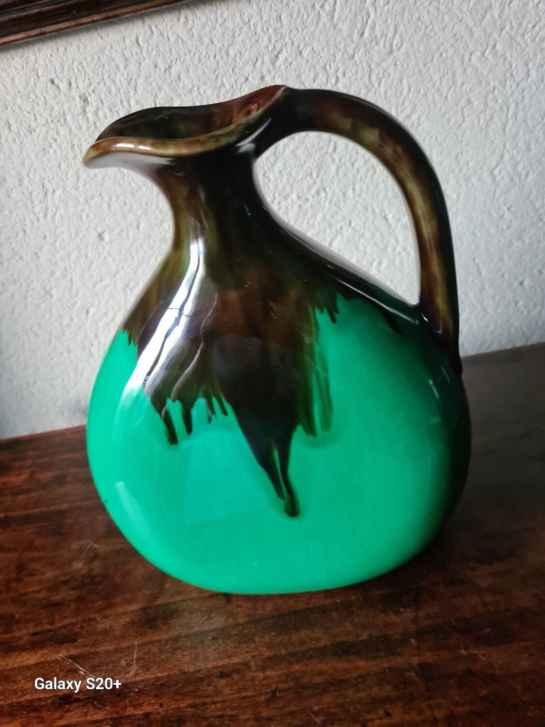 Green and brown ceramic vase