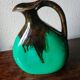 Green and brown ceramic vase