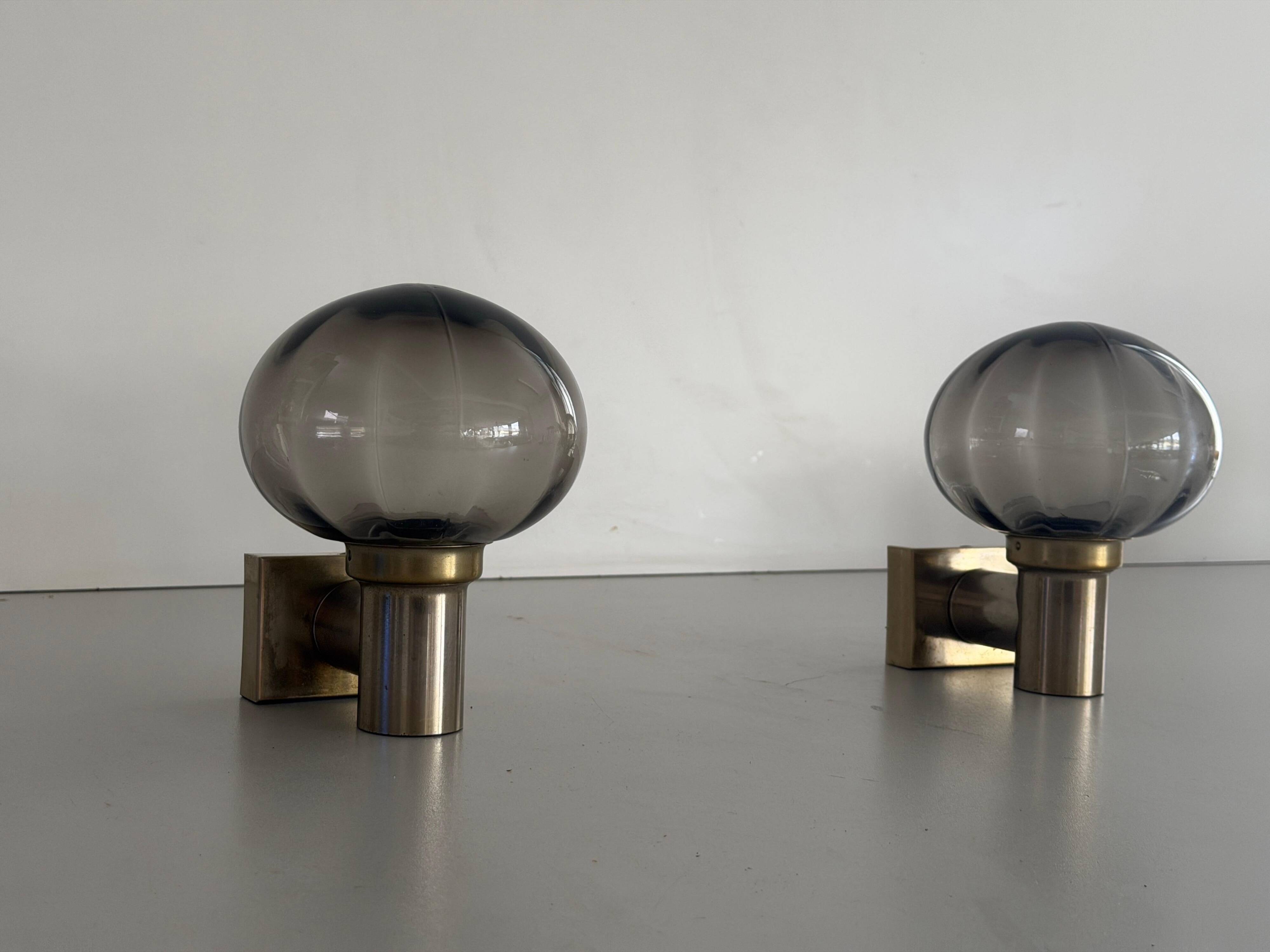 Pair of grey glass and chrome wall lights from the mid-century by N Leuchten, 1960s, Germany.