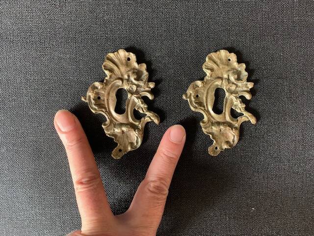 Pair of rocaille bronze keyholes from the 19th century