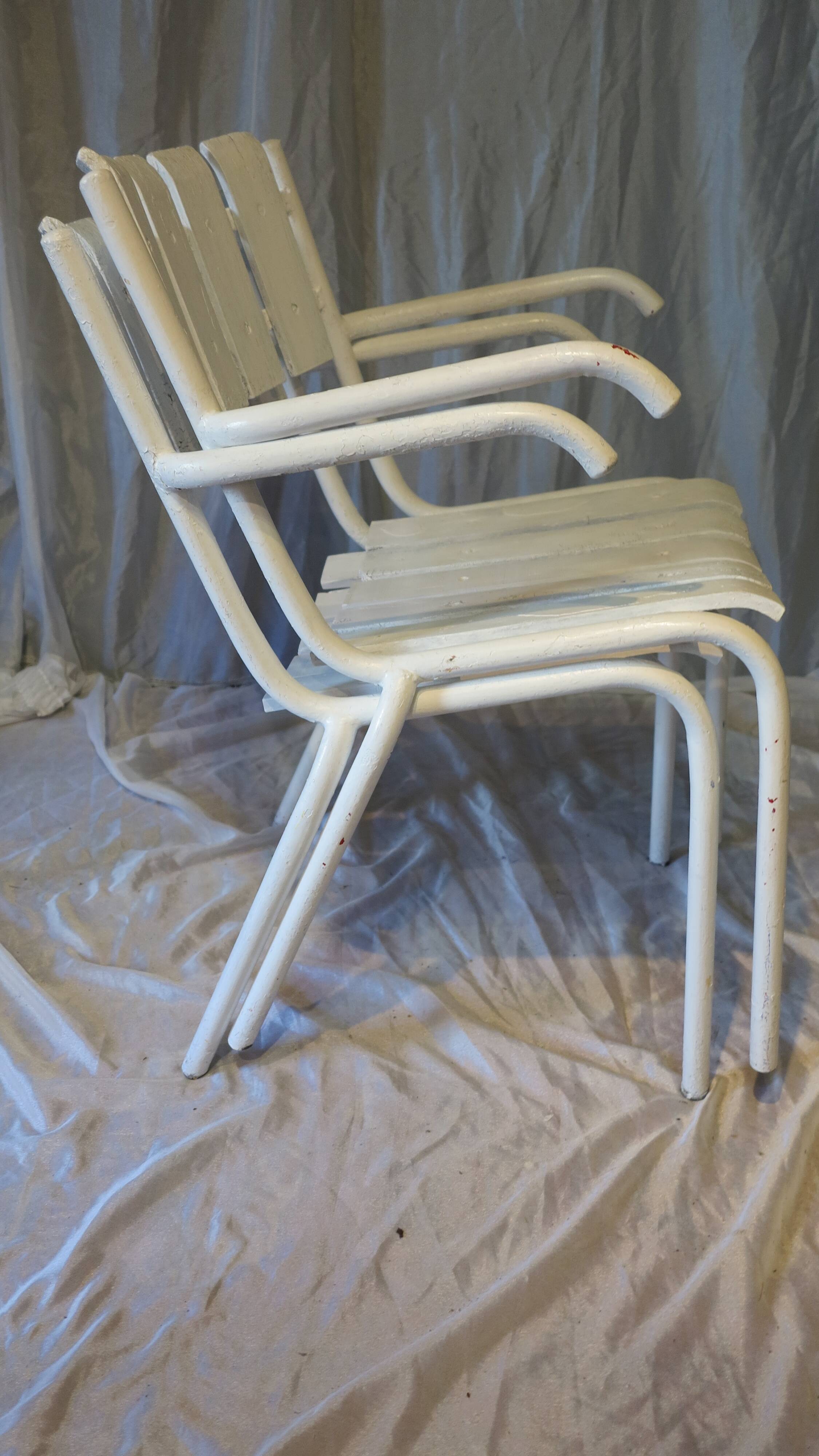 Pair of white garden armchairs