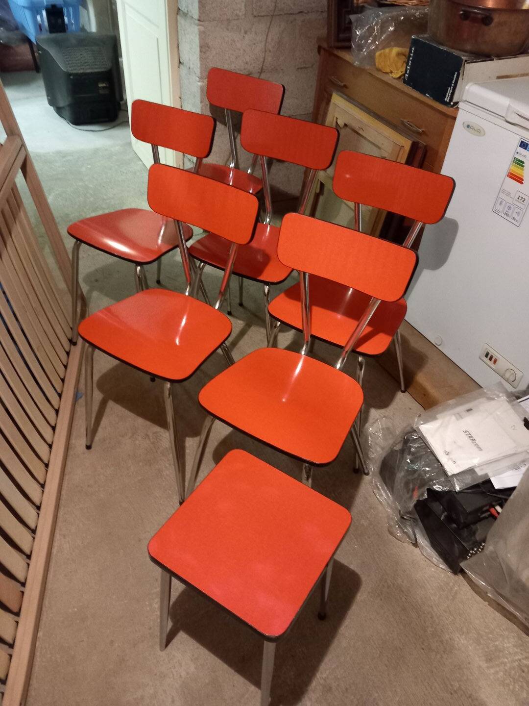 4 red formica chairs