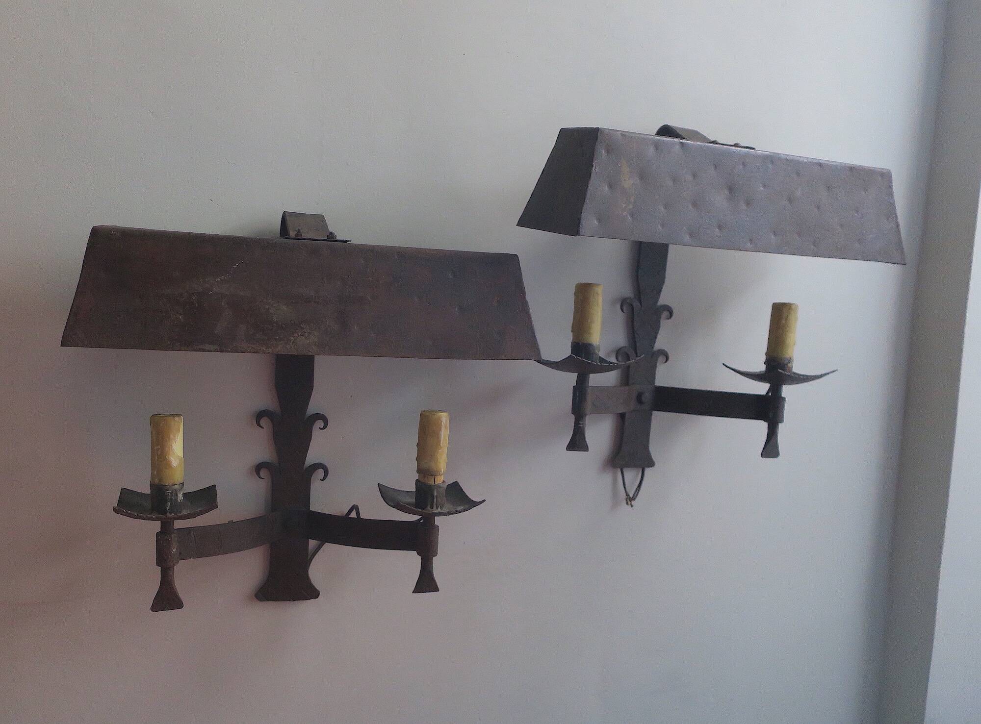 Pair of mid century Brutalist patinated iron wall lights, 1950s-60s
