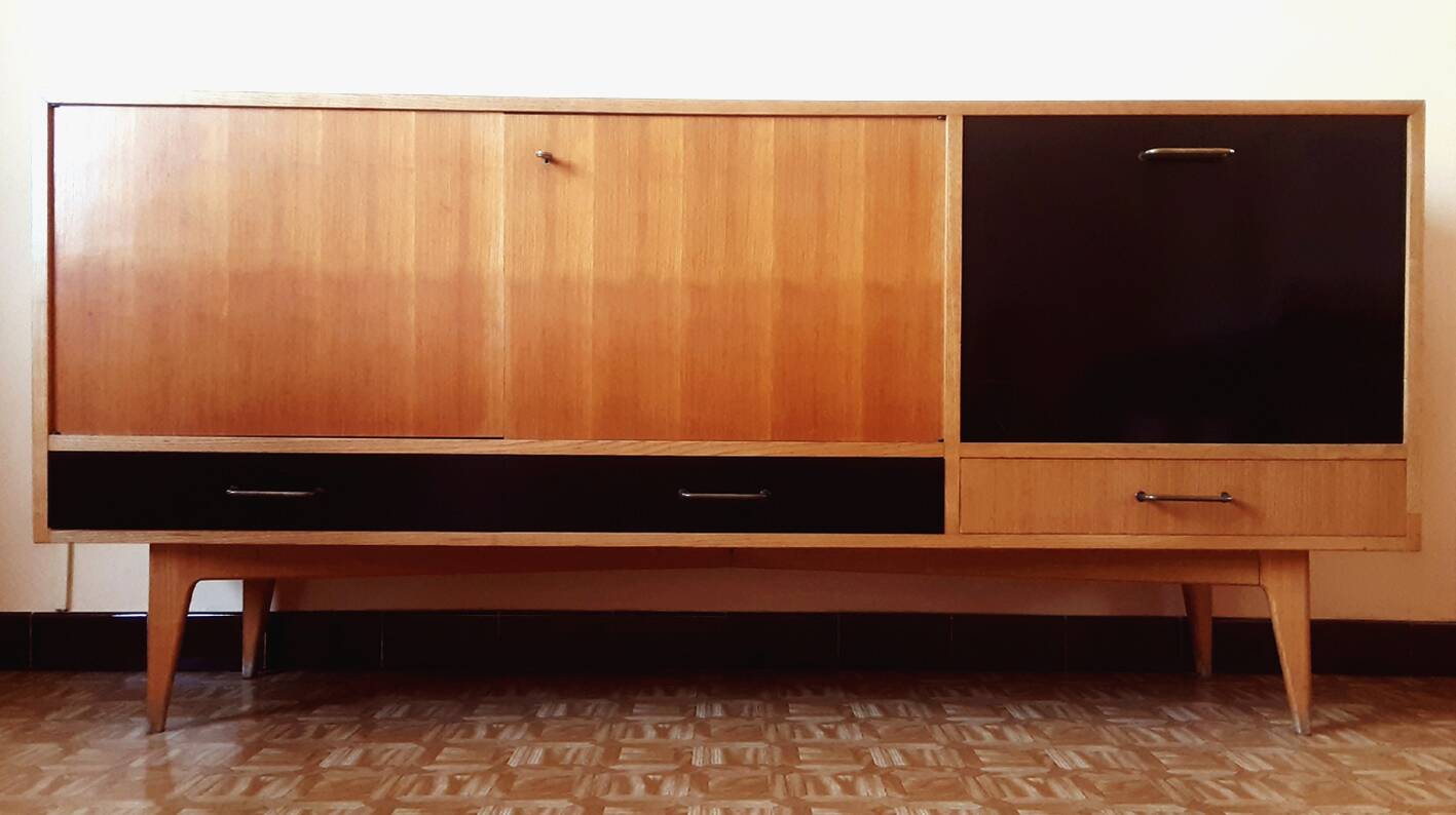 Sideboard in a row by Charles Ramos