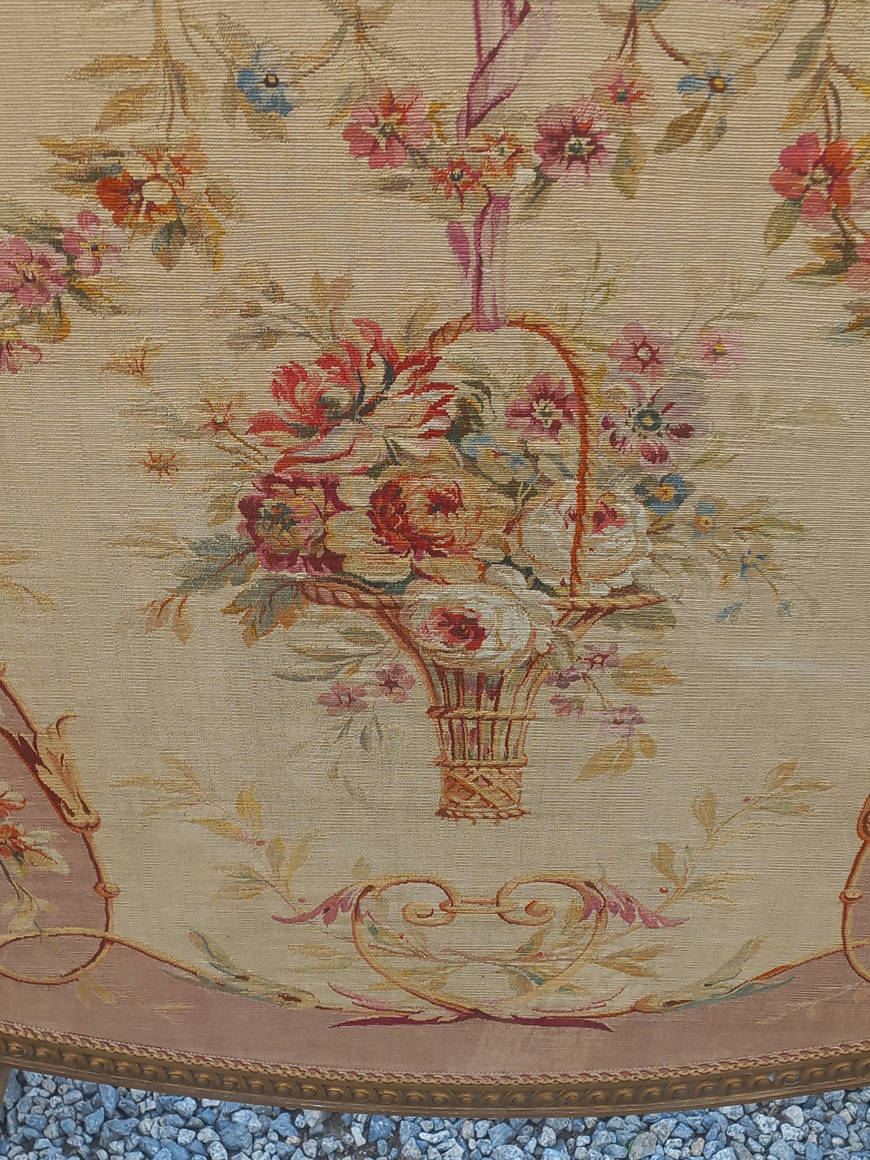 Golden wooden fireplace screen and Aubusson tapestry, 19th century.