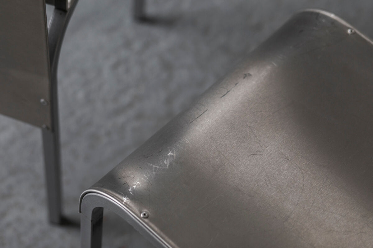 Set of 6 dining chairs in bent aluminum, 1980’s