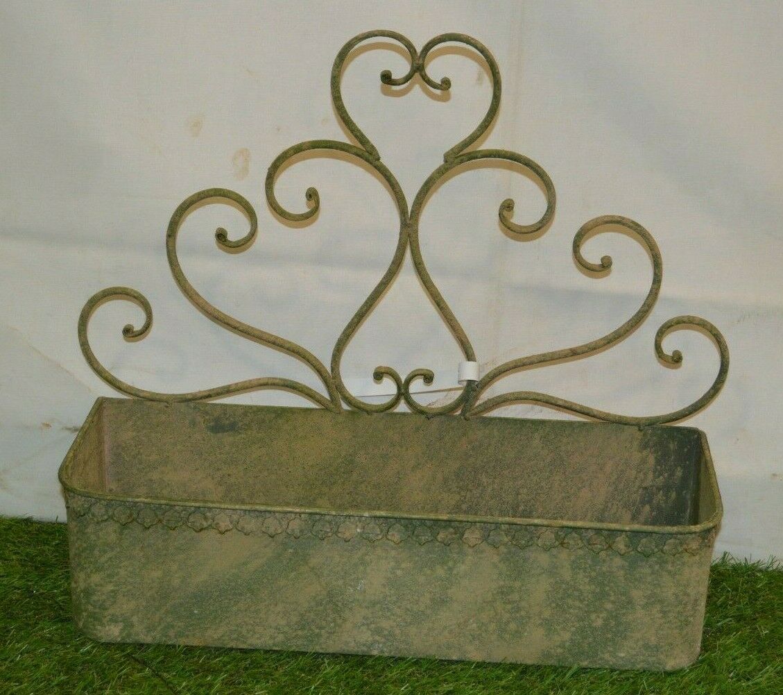 Patinated iron wall planter