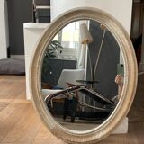 Miroir en bois de forme ovale