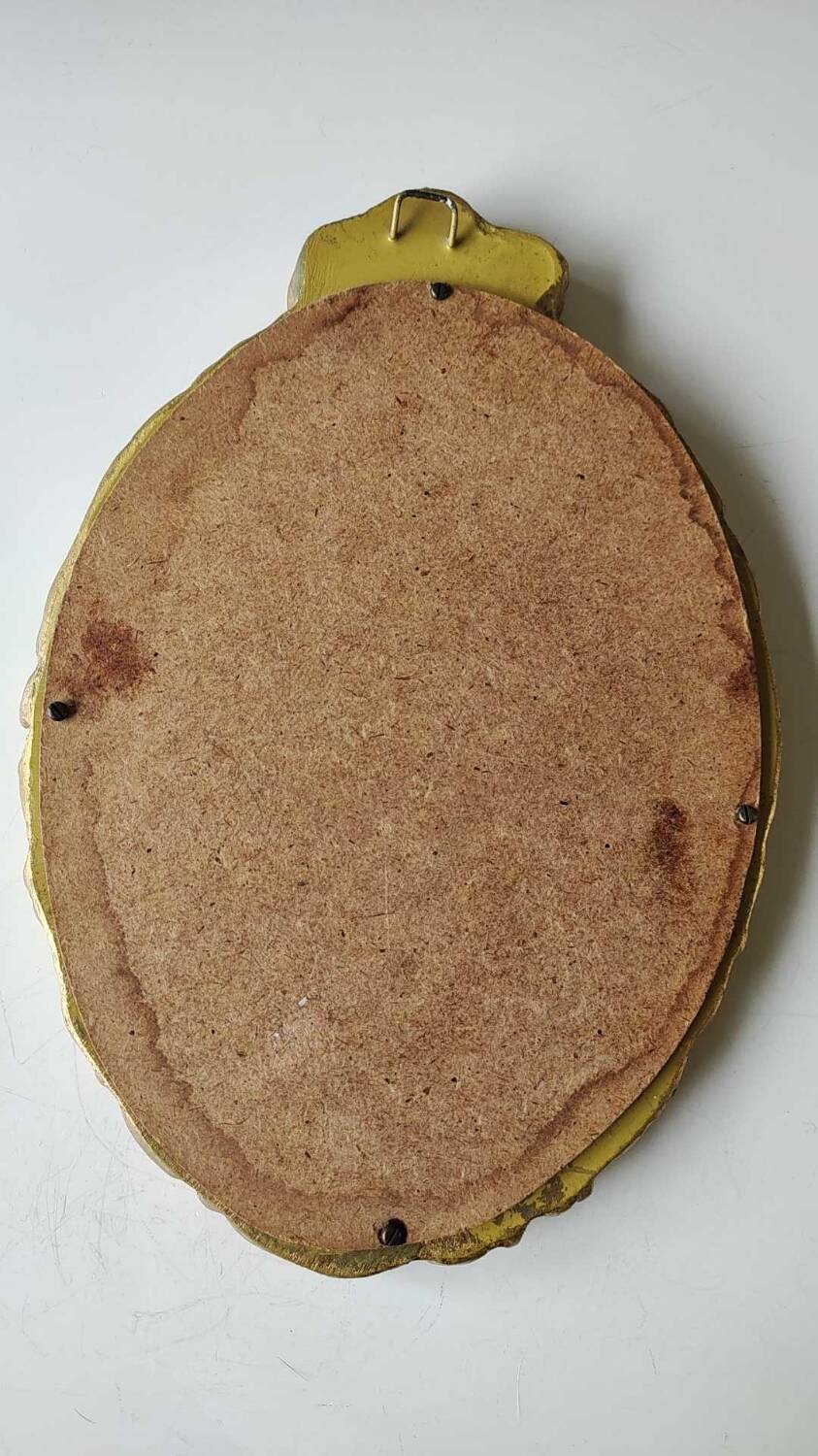 Hollywood Regency style oval Victorian mirror. In antique gold wood. 31 x 21cm
