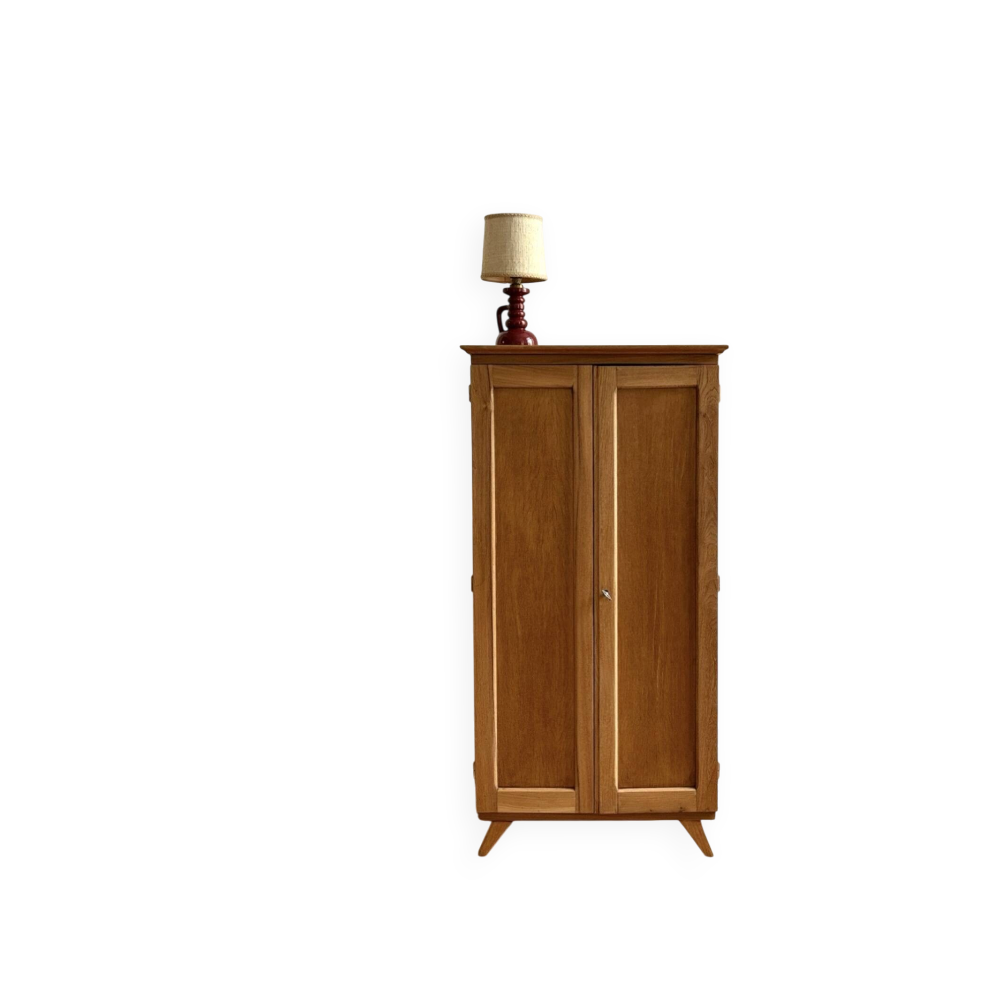 Small oak cabinet with tapered legs.