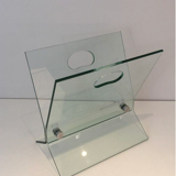 Design magazine holders in glass and brushed steel