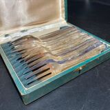 Box of forks in silver metal