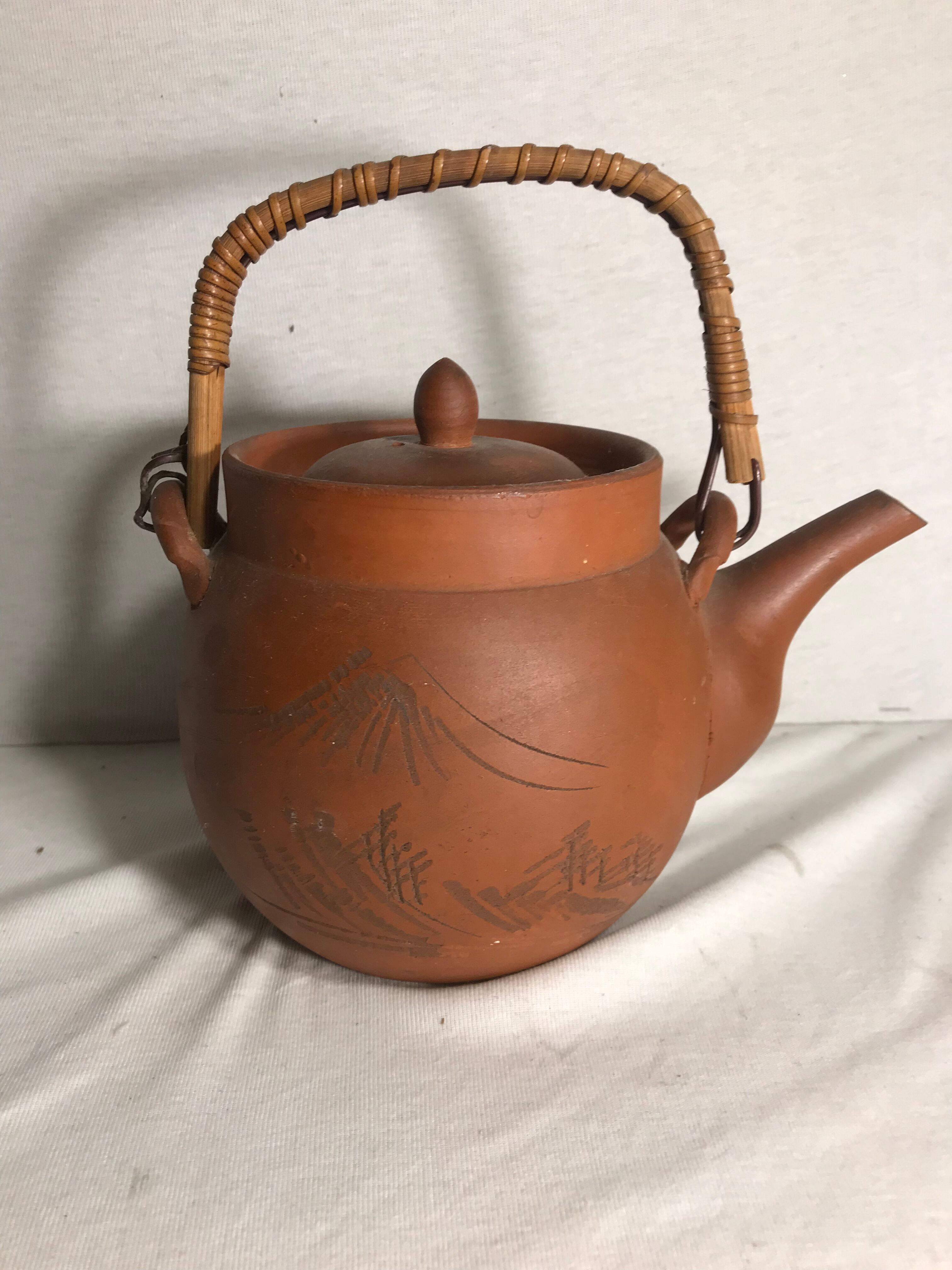 Antique terracotta teapot