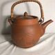 Antique terracotta teapot