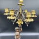 Candelabra with cherub in patinated bronze