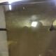 Table basse vintage "verre et laiton"