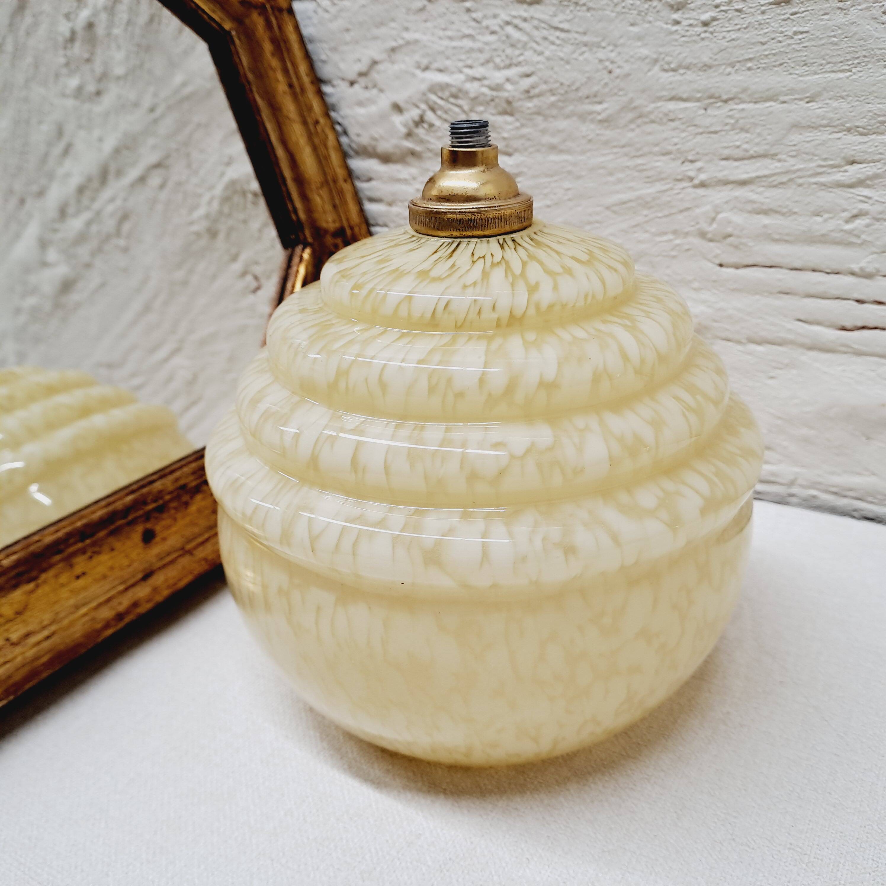 Pale yellow clichy glass globe