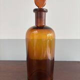 Small amber glass bottle