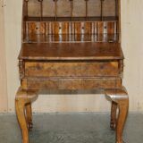 Writing desk in pollard oak from around 1800 with claw and ball carved legs.