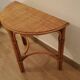 Rattan half-moon console