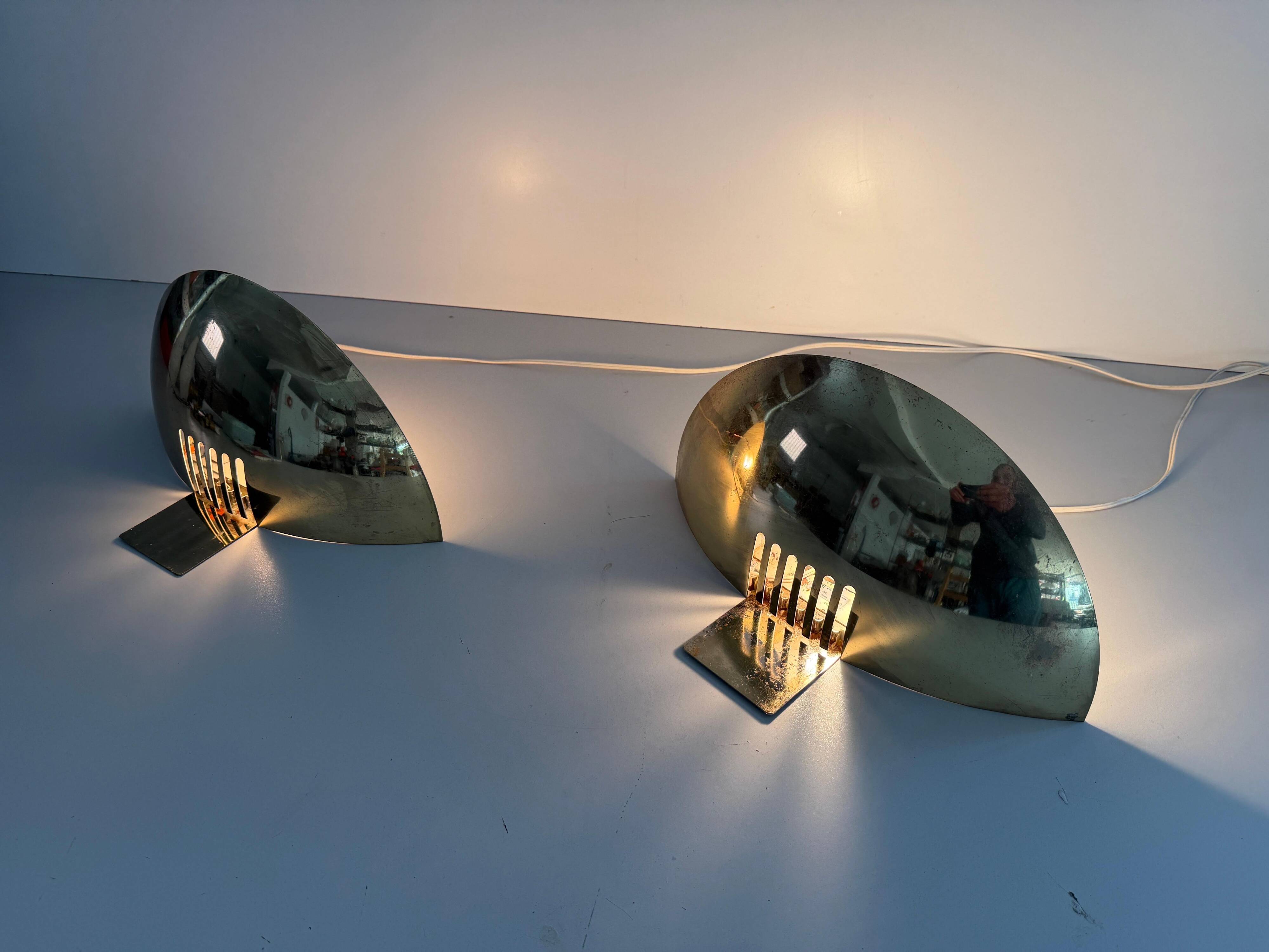 Pair of brass wall sconces from the mid-century by SCE, 1960s, France.