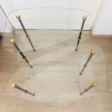 2 small side tables in glass and Bakelite with gold nuts from the 1960s.