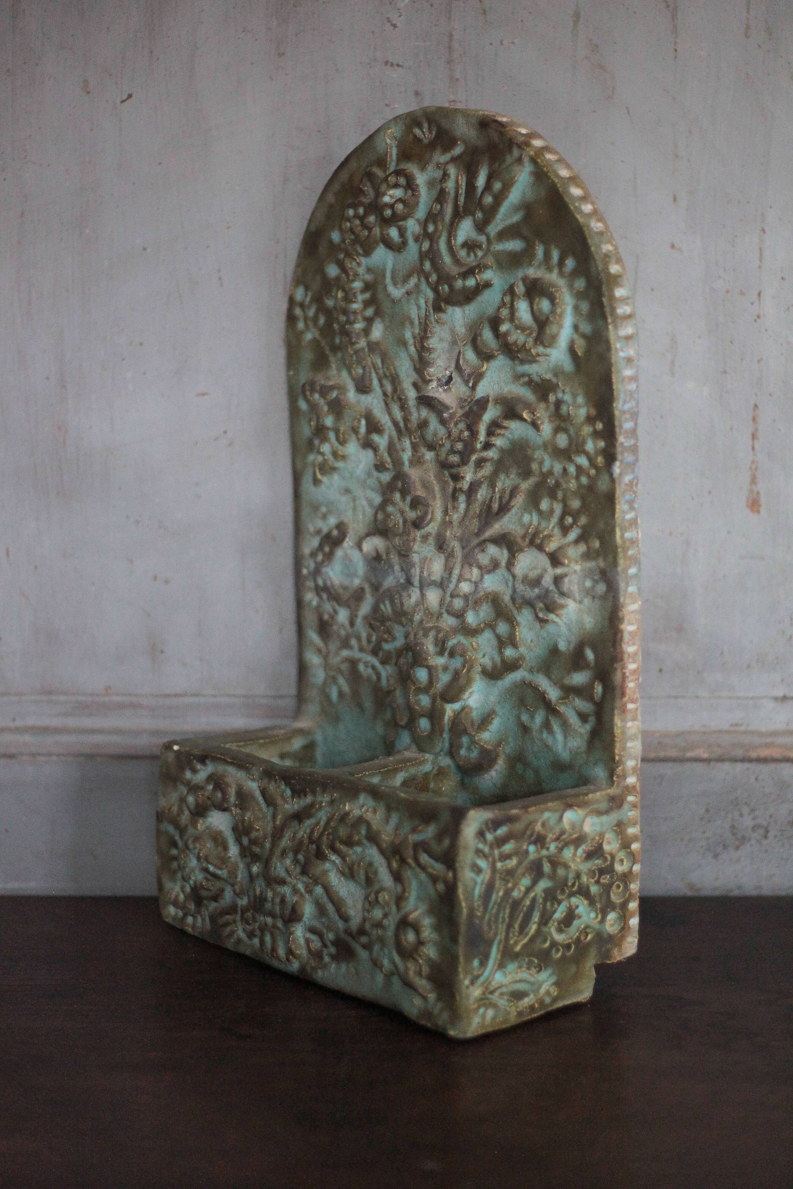 Pair of signed ceramic wall planters, pot cover