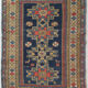 Handwoven blue ground persian rug with bird-like figures