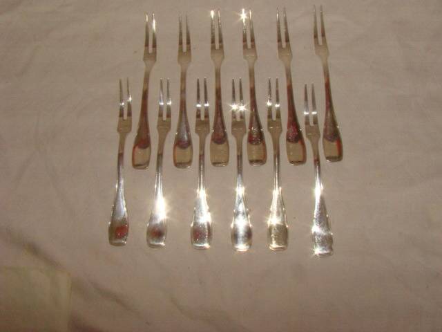 12 silver-plated snail forks with case
