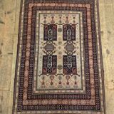 Persian rug in beige wool 150x100
