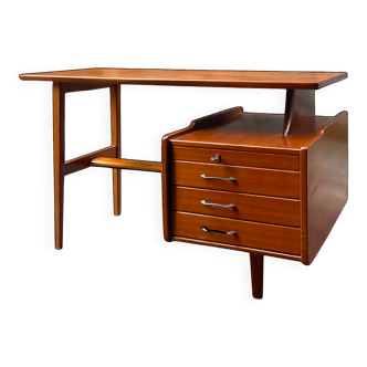 Mahogany desk with drawers by Jacques Hauville published by Bema.