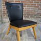 Cocktail armchair of the 50s in wood and black imitation