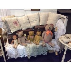 Vintage children's bed with white patina