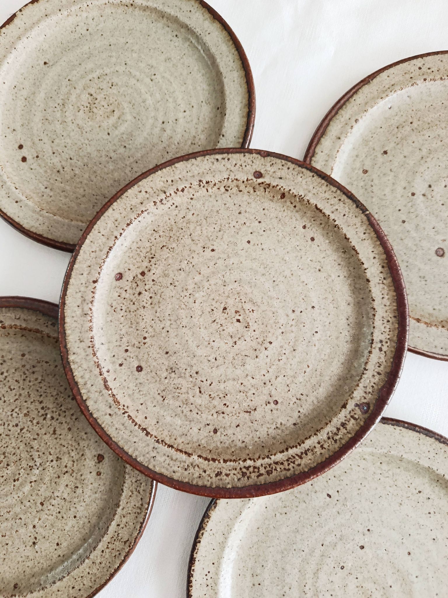 Set of 5 dessert plates by Jean Tessier, Le Cep, in pyrite stoneware.