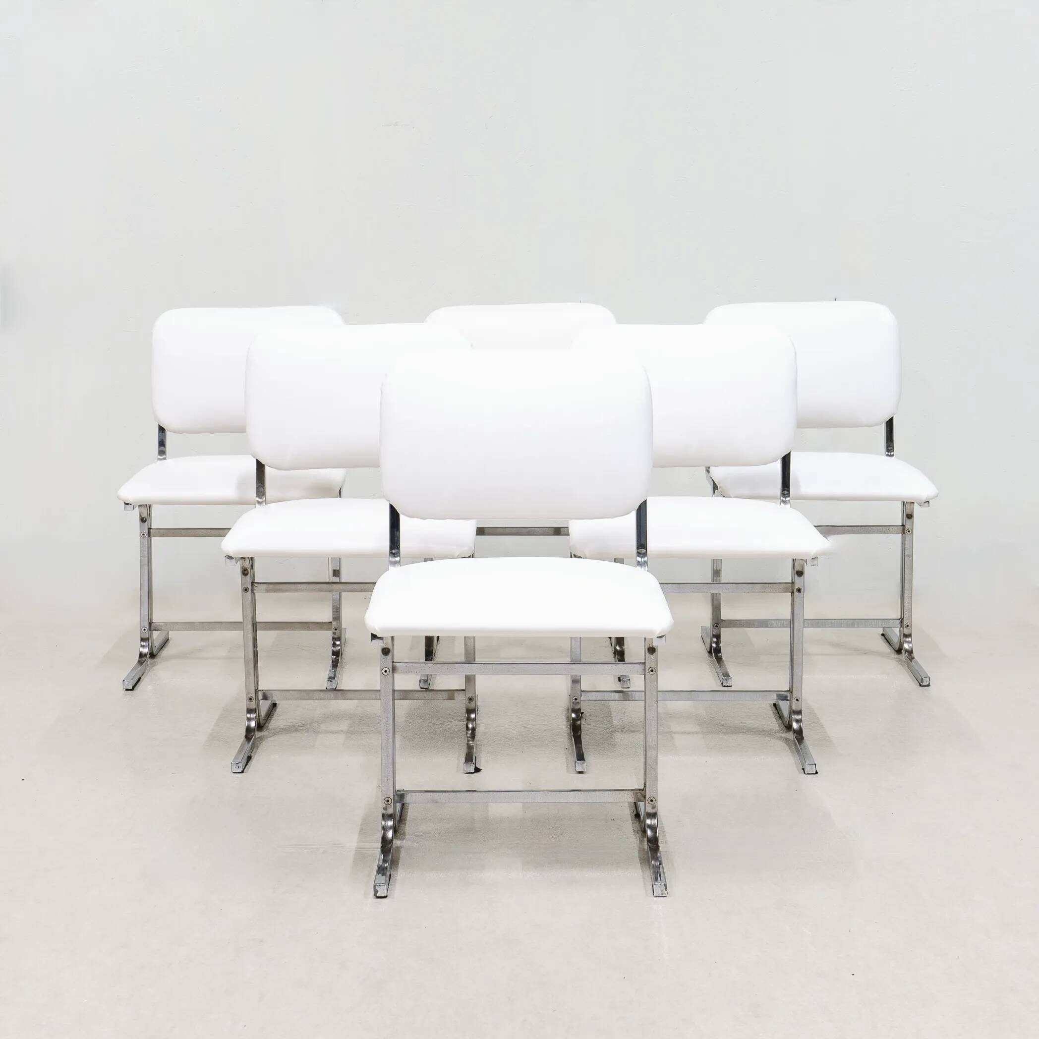 Six chairs. Italy 1970s.