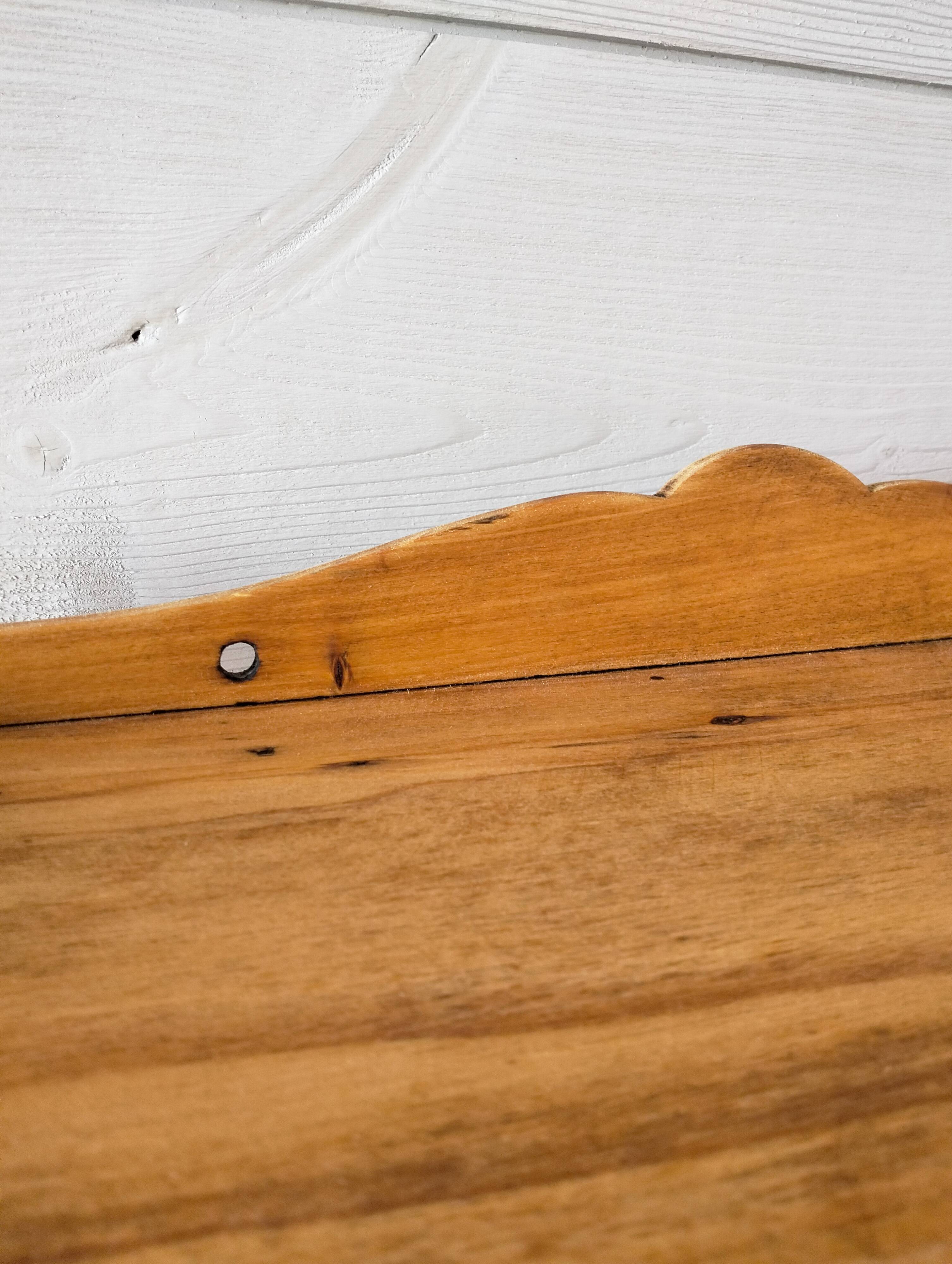 Scalloped wooden shelf