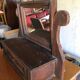 Rustic brown pine mirror, 1920s German style with decorative drawer casing.