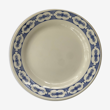 White porcelain dessert plate floral pattern on the perimeter