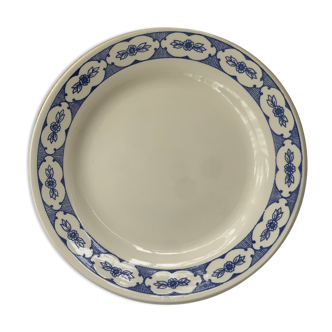 White porcelain dessert plate floral pattern on the perimeter