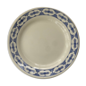 White porcelain dessert plate floral pattern on the perimeter