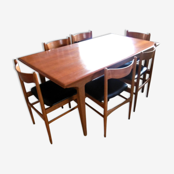 Table with two extensions and its 6 chairs scandinavian teak of the 1970s