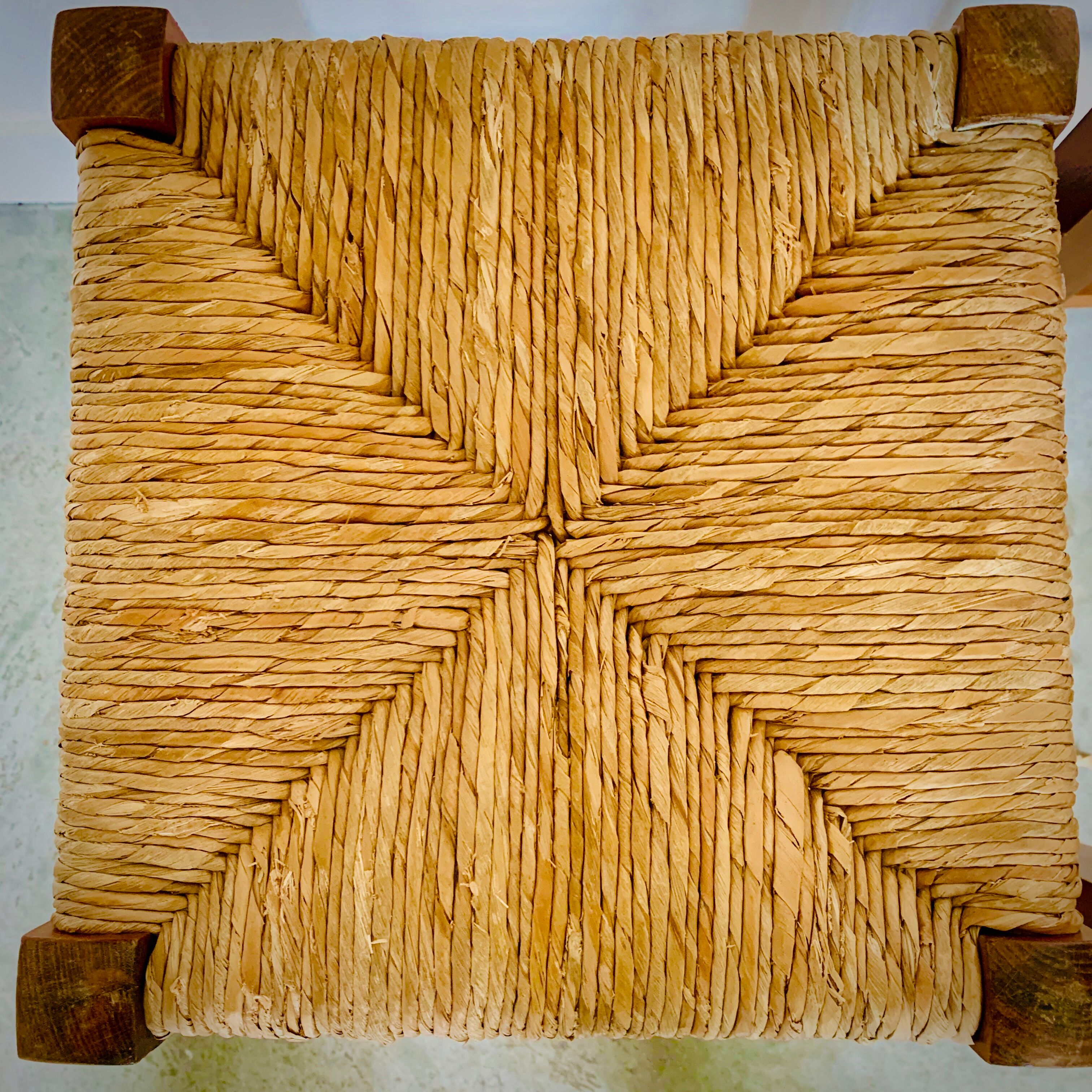 Two light wooden stools varnished and mulched seat