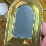 Set of five small wall mirrors in brass.