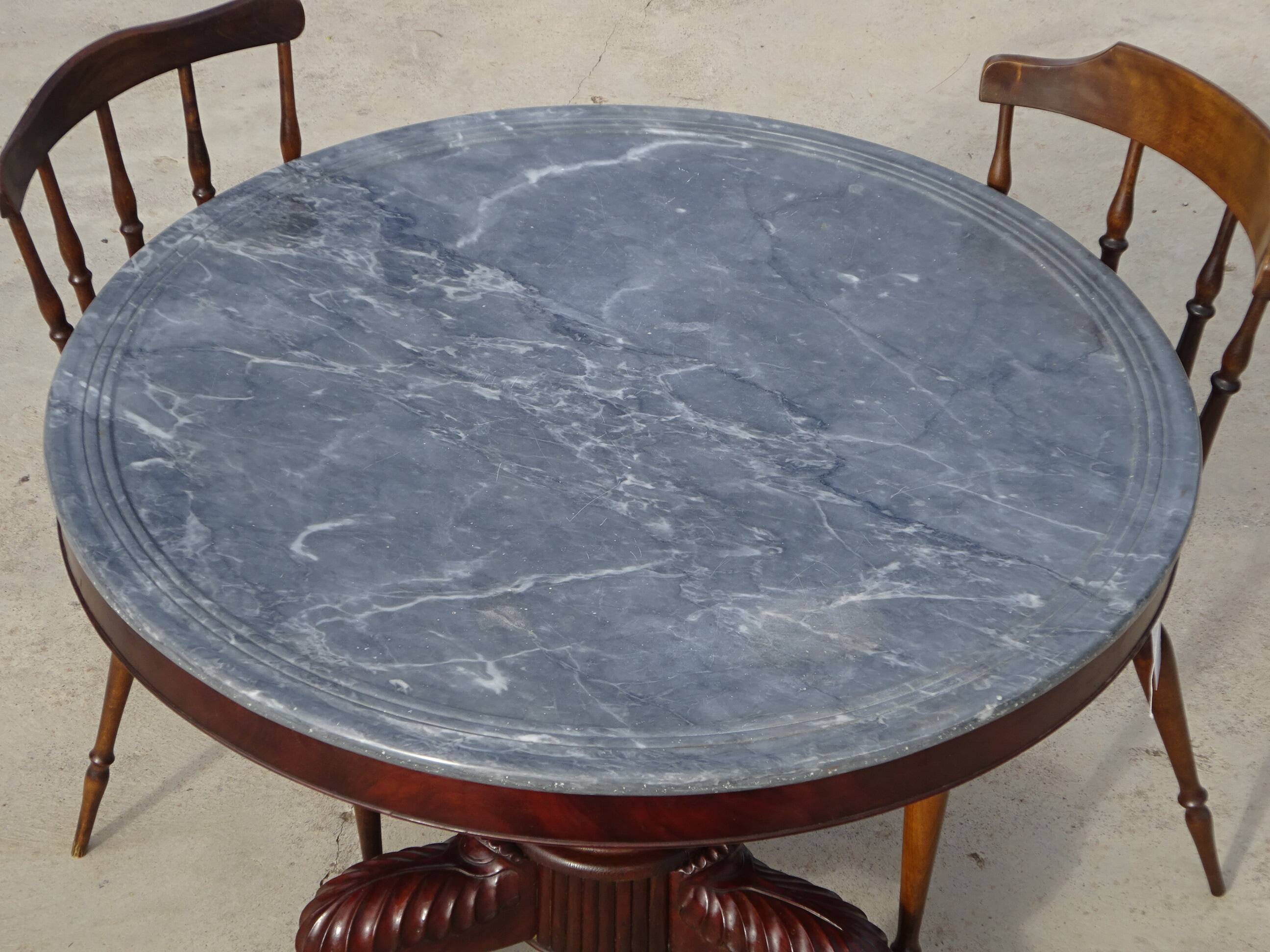Empire guéridon in mahogany and marble, revolving top.