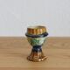Late 19th-century earthenware egg cup in slipware