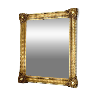 Mirror from the Restoration period, antique gilded, 19th century.