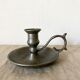 Tin thumb candle holder