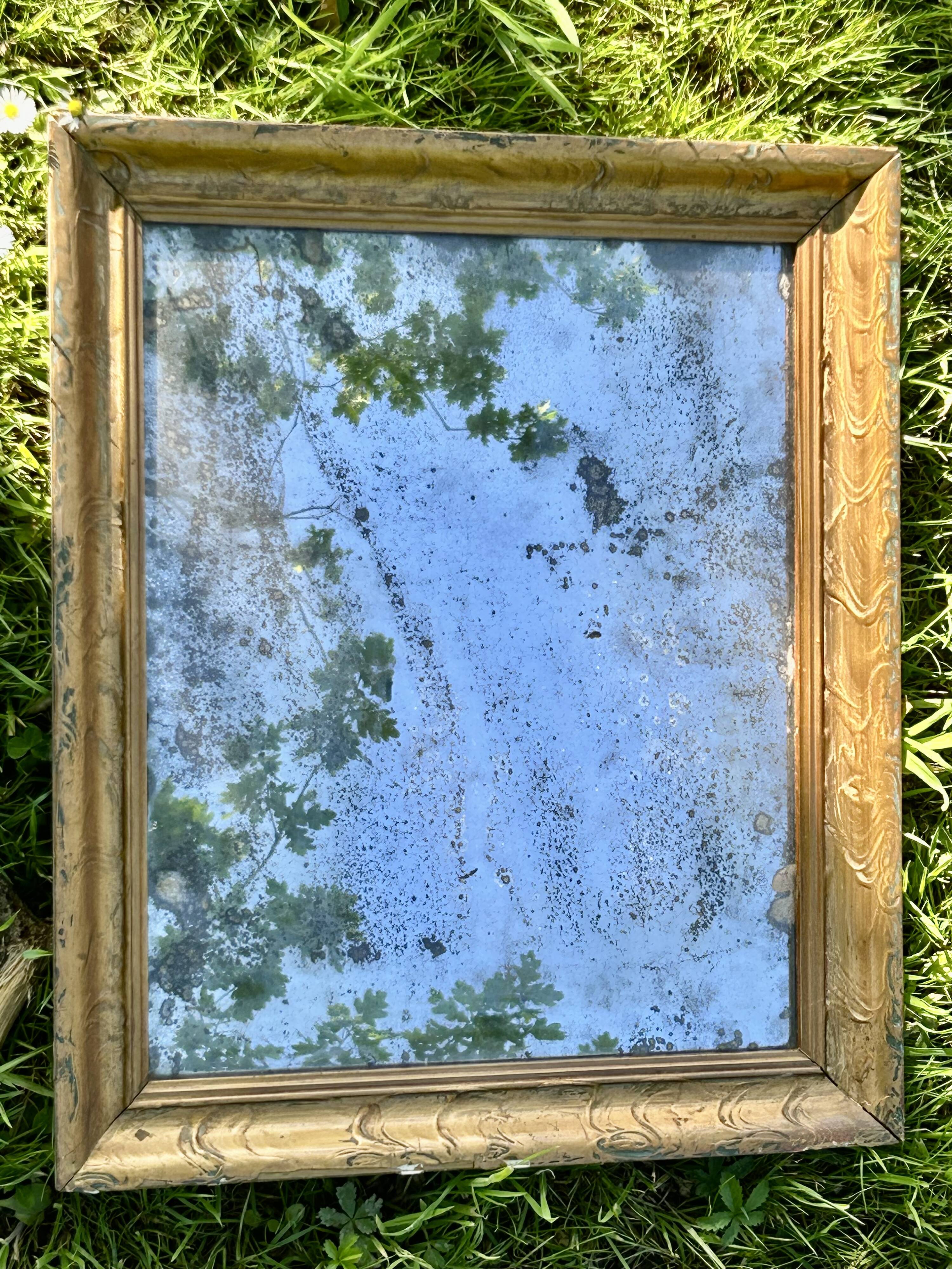 antique moulded wood and gilded stucco mirror - de-mercurised mirror sold in the e